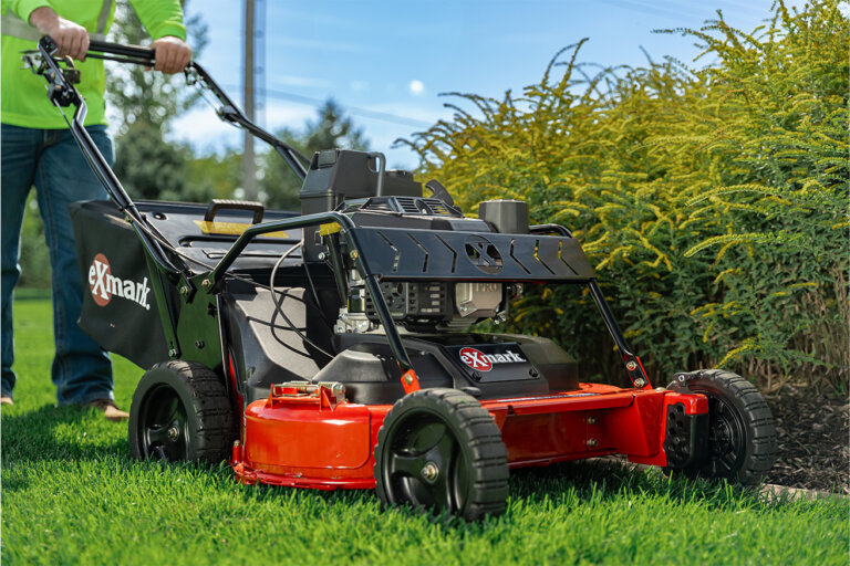 Exmark Commercial 30 walk behind mower in yard