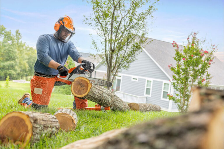 Man cutting a log with a Stihl MS 172 chain saw