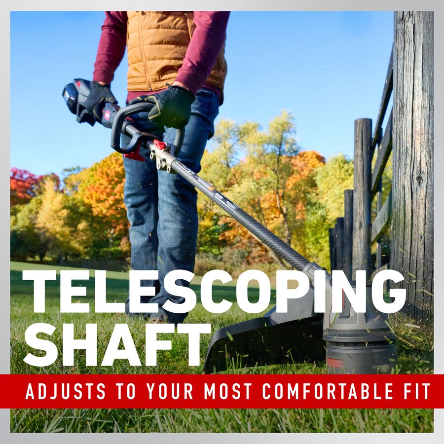 Person using the Toro battery trimmer with a headline for the telescoping shaft