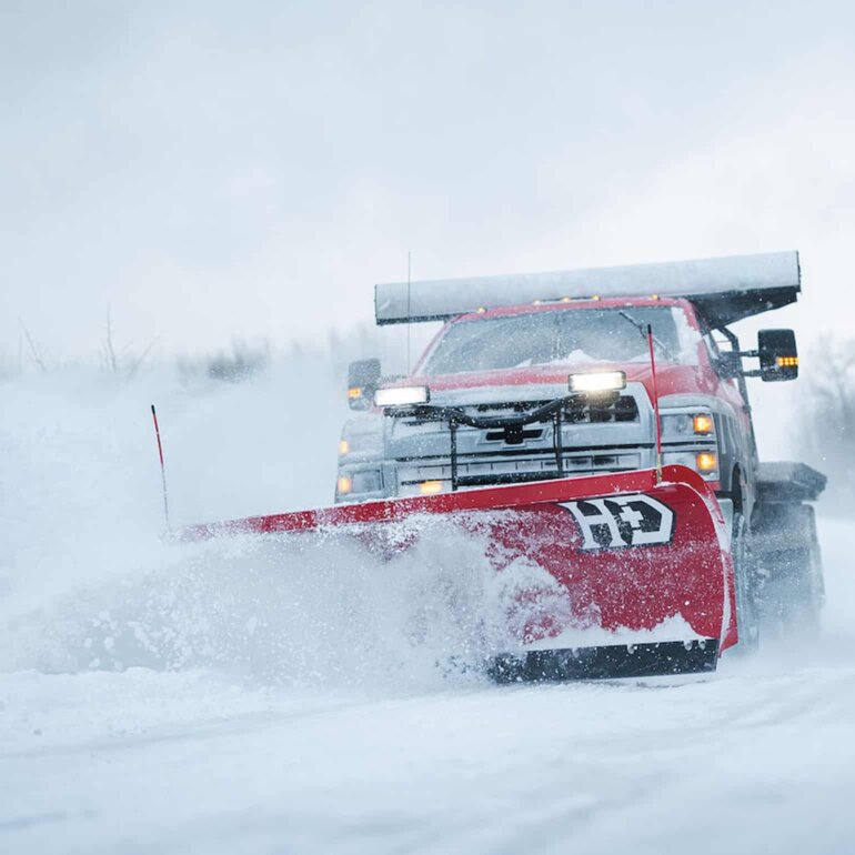 BOSS HD+ snow plow plowing snow in winter