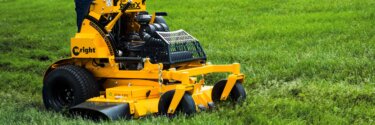Wright Stand-On mower in grass