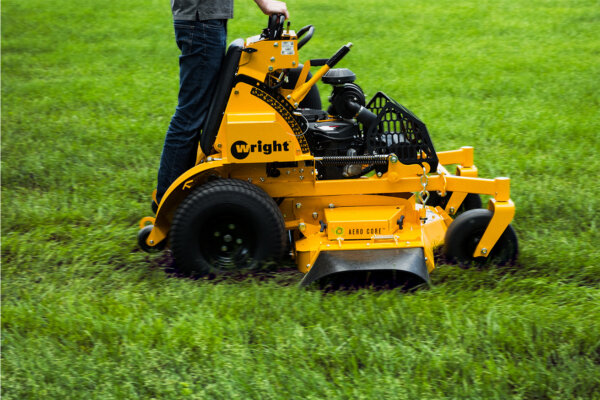 Wright stand on mower cutting grass
