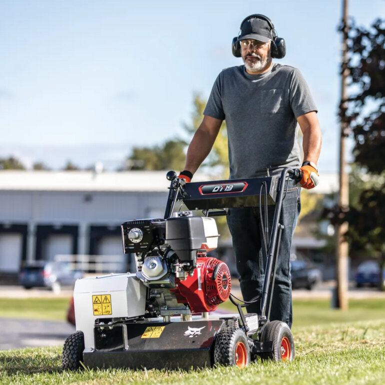 Bobcat DT19 dethatcher front view working in yard