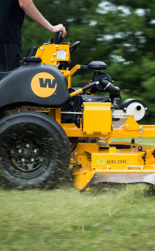 Wright ZK stand on mower cutting grass