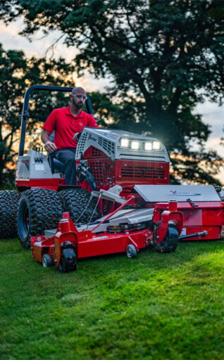 Ventrac tractor cutting grass