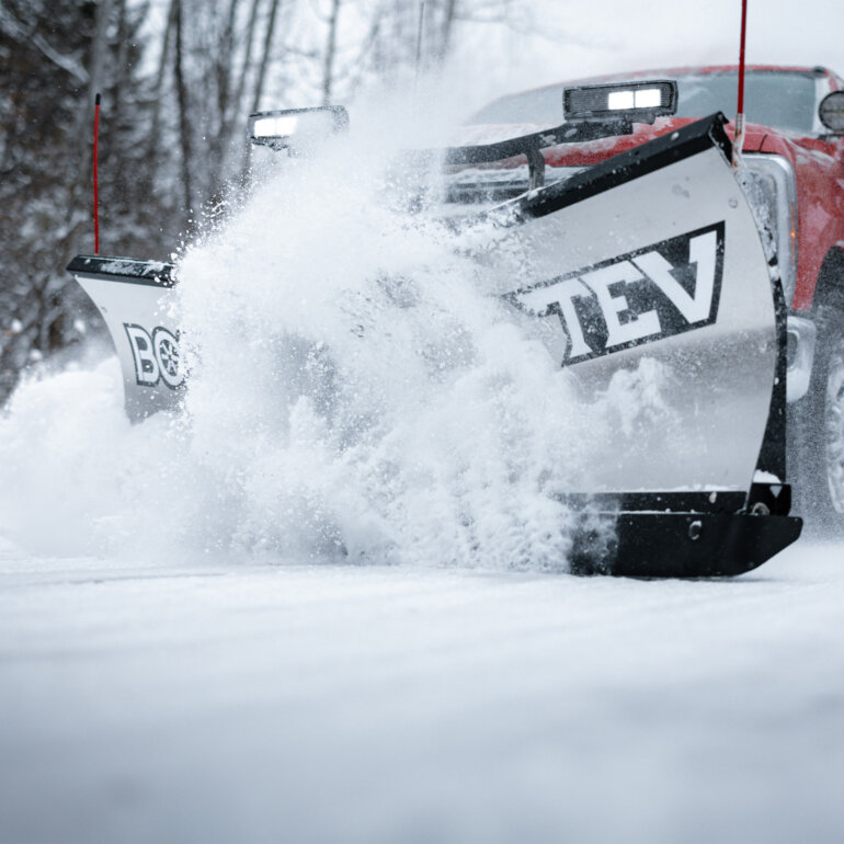 BOSS TEV snow plow in snow close up