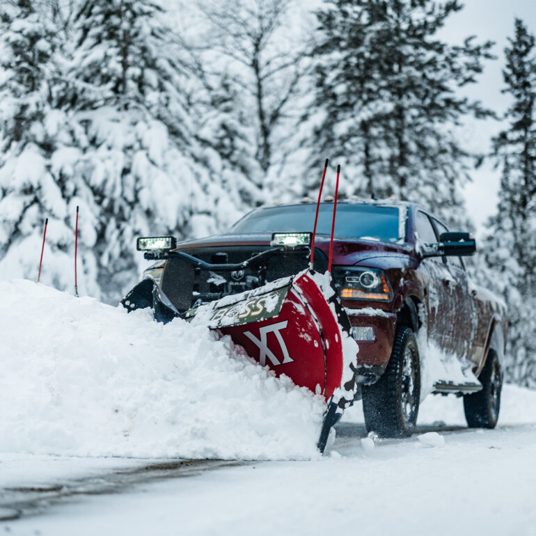 BOSS XT snow plow on snowy road
