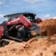 Close up view of Yanmar TL65RS track loader with bucket full of dirt