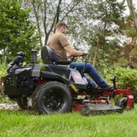 Toro Titan zero turn mower cutting grass