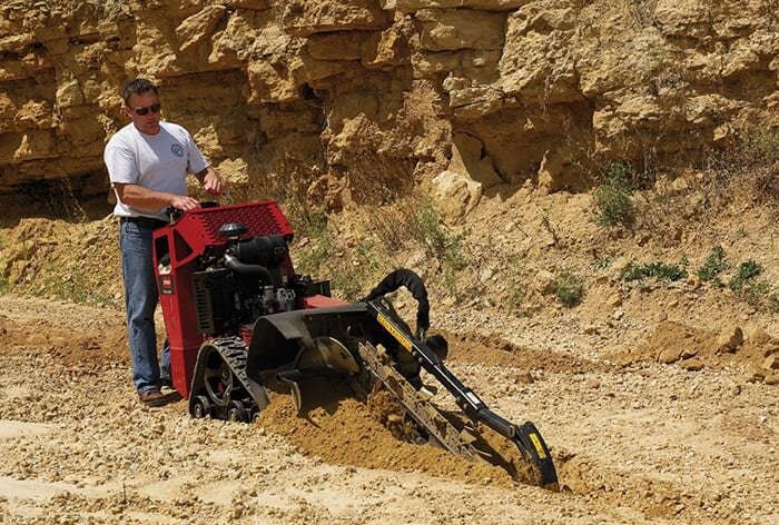 Toro TRX-16 walk behind trencher working on job site