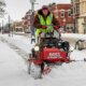 BOSS Snowrator plowing snow from sidewalk