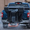 Salt Dogg salt spreader dropping salt in parking lot