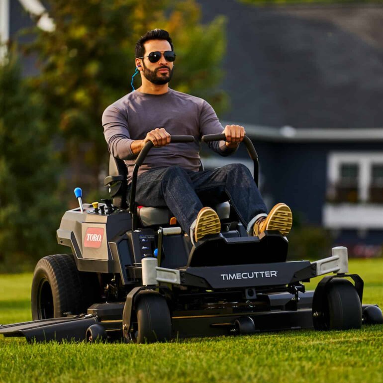 Toro 75763 zero turn mower cutting grass